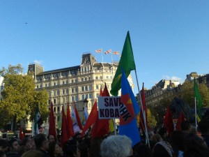 Contrasting flags seen from Trafalgar Square -- and a spying eye in the sky