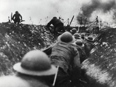 British soldiers move up through a trench at the Somme battle, Northern France, to begin attack, WWI
