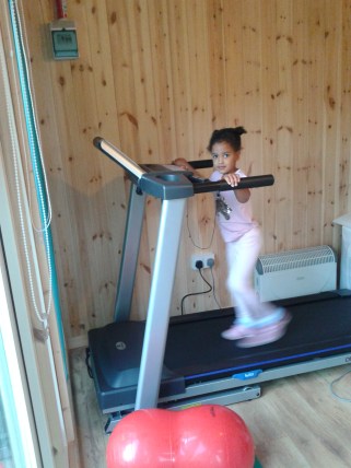 Caitlin Rose on her daily exercise treadmill