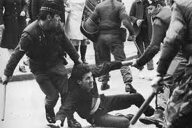British soldiers detaining a man in the Six Counties during the internment operation in August 1971.