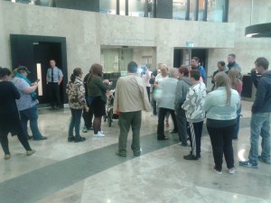 Some of the crowd of supporters welcome Bennet as he emerges into the court ground floor lobby. His daughter Saoirse can be seen the left holding Bennet's grandson. Unfortunately, Bennet himself is hidden by a supporter moving forward as photo was taken.