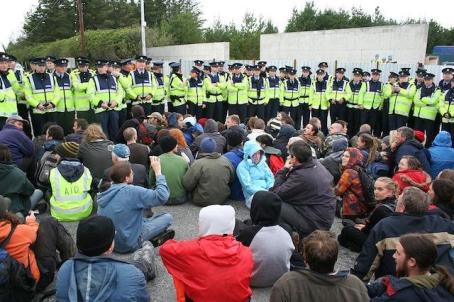 Gardai defending Shell confront protesters