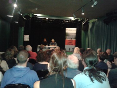 Section of the crowd at the public mee