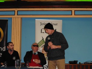 Reading the short poem "History" (Tim Pat Coogan in background) (photo Denis Finegan)