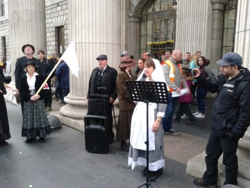Donna Cooney as Nurse O'Farrell, reading a poem by Theo Dorgan