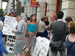 Supporters and members of the public at campaign table outside Lynam Hotel during the week