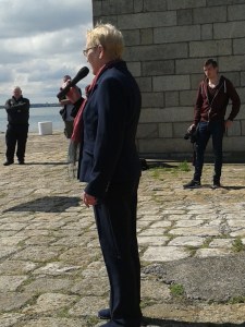 Margaret McKearney speaking and chairing the occasion on the pier