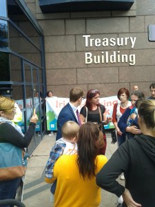 Families and supporters confronting NAMA PR representative Martin Whelan (in blue suit) (Photo: D. Breatnach)