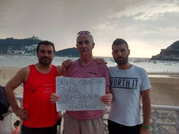 R-L: Julen, Diarmuid, Hektor. Donosti bay in the background with island partly visible. Storm building in the sky.