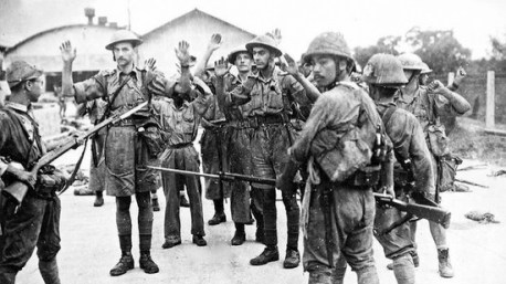 British soldiers surrendering to Japanese Army at the Surrender of Singapore 1942.