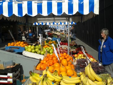 Some of the few surviving fruit stalls on Moore Street, half-way down the main stall street, east side, looking northwards. (source: D.Breatnach)