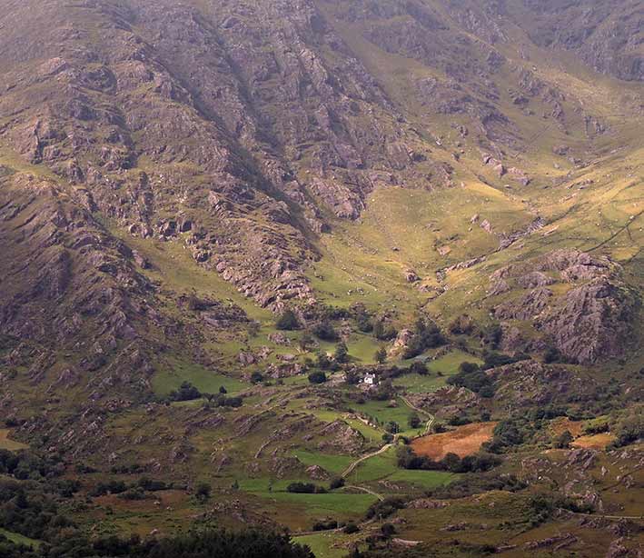 photo by eoin mac lochlainn of cottage in the mountain near the healy pass, Co.Kerry
